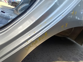 Rear left quarter wing of a Ford Fusion mk5 13-20 on the body, silver, dented, dents, putty