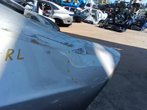 Rear left quarter wing of a Ford Fusion mk5 13-20 on the body, silver, dented, dents, putty