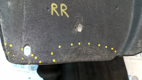 The rear right fender liner of a Ford Fusion mk5 13-20 is bent.