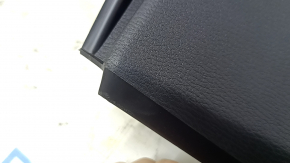 Mitsubishi Outlander 22-25 black lower center dashboard trim, scratches, whitened plastic on the mount