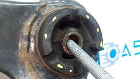 The front subframe of a Toyota Camry v40 is rusty, with four cracked bushings.