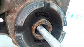 The front subframe of a Toyota Camry v40 is rusty, with four cracked bushings.