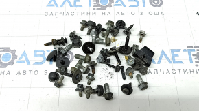 Incomplete set of hardware for the bumper, hood, and fenders of a Toyota Camry V40