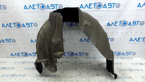 The rear left fender liner of a Toyota Camry v40 has a torn mount.