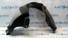 The rear left fender liner of the Kia Optima 11-13 is torn.