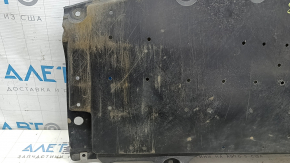 The lower front bumper trim on a Mazda CX-9 16-23 is worn.
