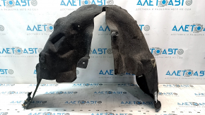 The rear right fender liner of a Chrysler 200 15-17 is torn.