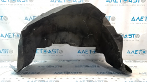 The rear left fender liner of a Nissan Pathfinder 13-18 is torn.