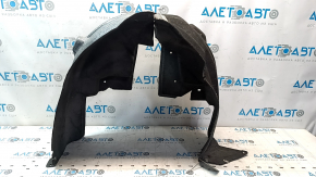 The rear left fender liner of a Chevrolet Volt 16 is torn and the seam has come apart.