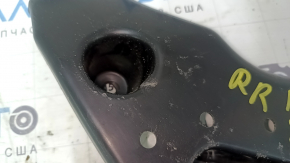 The rear right underbody protection of a Mitsubishi Outlander 22-25 is dented.