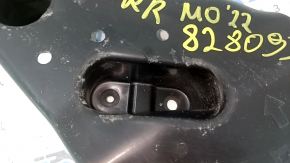 The rear right underbody protection of a Mitsubishi Outlander 22-25 is dented.