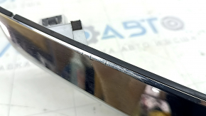 Trunk door molding between the headlights of a Mazda CX-9 16-23, chrome, scratches