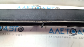 The plastic wiper grille for a Ford Edge 15-24 has a broken guide.
