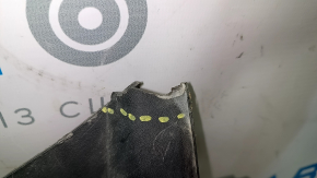 The plastic windshield wiper grille for a Chevrolet Volt 11-15 has broken corners.