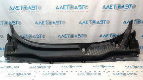 The Honda Accord 18-22 plastic windshield wiper grille is cracked.