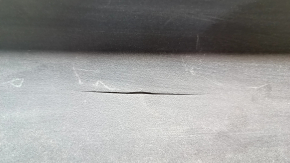 The Honda Accord 18-22 plastic windshield wiper grille is cracked.
