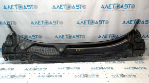 The Honda Accord 18-22 plastic windshield wiper grille is cracked.