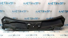 The plastic windshield wiper grille for an Infiniti QX30 2017-2019 is cracked and missing a fastener.