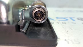 The driver's left knee airbag for the Audi E-Tron 19-23 has scuffs and a rusty squib.