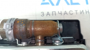 The driver's left knee airbag for the Audi E-Tron 19-23 has scuffs and a rusty squib.