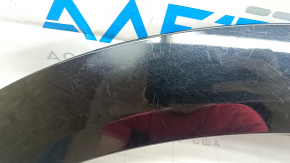 The rear right fender arch trim of the Audi E-Tron 19-23 is worn out.