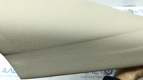 Right side panel of the 2nd row of seats for an Audi Q5 80A 21-24, beige leather, wrinkled, needs cleaning.