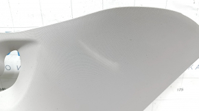 The trim on the rear pillar behind the left window of a Toyota Sienna 21-24 is gray, the plastic has turned white.