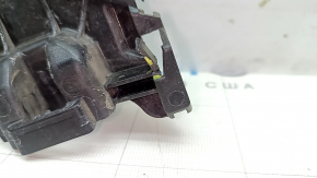 The right rear bumper mount on the Audi E-Tron 19-23 fender is broken.
