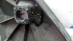 The lower central rear bumper bracket for the Audi E-Tron 19-23 is broken and cracked.