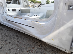 Front right quarter panel of an Audi Q5 80A 18-24 on the body, white, dented threshold