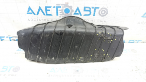 The lower control arm cover under the rear left spring of the Audi Q5 80A 18-24 is dented, worn, and has tears.