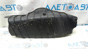 The lower control arm cover under the rear right spring of the Audi Q5 80A 18-24 is dented, worn, and has tears.