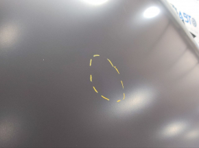 The hood of a Toyota Camry V50 12-14 USA is bare steel, with dents and a fold.