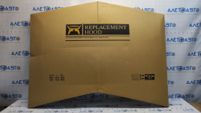 The hood of a Toyota Camry V50 12-14 USA is bare steel, with dents and a fold.