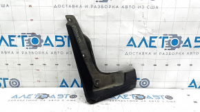 The front left mudguard of a Toyota Sienna 21-24 is worn.