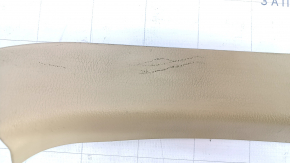 Left trunk lid trim for a Subaru B10 Tribeca, beige, scratches, nicks