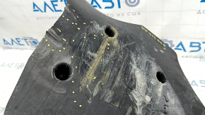 The rear right control arm cover under the spring of the BMW 3 G20 19-24 is worn and dented.