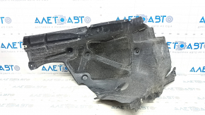 The front left rear fender liner of a BMW 3 G20 19-25 is torn.