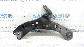 The lower front left control arm of a Toyota Sienna 21-24 has a cracked silent block.