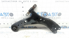 The lower front left control arm of a Toyota Sienna 21-24 has a cracked silent block.
