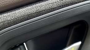 Door trim panel rear left Nissan Rogue 21-23 US built black without curtain with gray insert cloth, armrest leather, brown top, with handle, scratches, whitened plastic