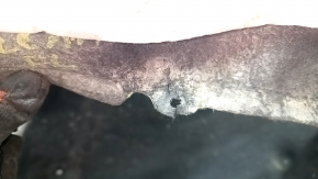 The front left fender liner of a Toyota Sienna 21-24 is torn.