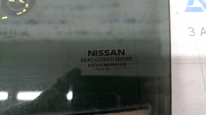 Rear left door glass for a 2014 Nissan Rogue, US built, tinted, scratches