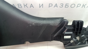 Tesla Model Y 20-25 black, worn driver's seat trim bracket, right side
