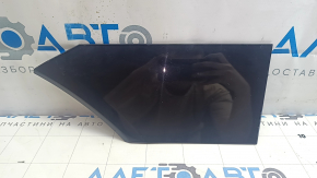 Left Audi E-Tron 19-23 charging port cover scratches