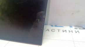 Left Audi E-Tron 19-23 charging port cover scratches