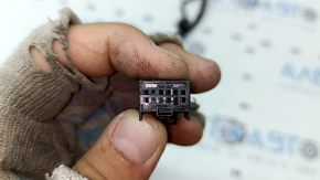 The wiring for the rear bumper of a Porsche Macan 15-25 for parking sensors and a camera is oxidized.