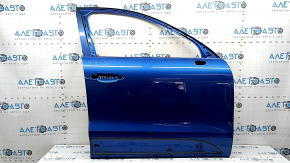 The front right door of a Porsche Macan 15-24 blue M5J is bare, with a dent.