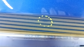 The front right door of a Porsche Macan 15-24 blue M5J is bare, with a dent.