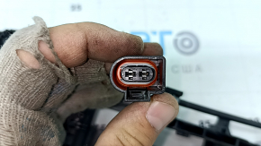 The rear right door handle mechanism of a Porsche Macan 15-24 for keyless operation is broken.